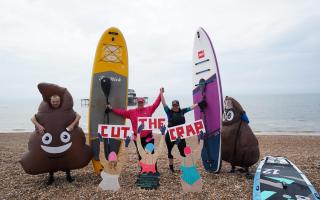 Andrew Walker, far left, and Kevin Elliot, far in fancy dress with Surfers Against Sewage protesters
