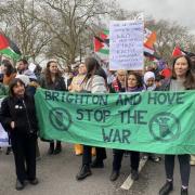 Members of Stop the War Brighton and Hove protesting in Brighton.