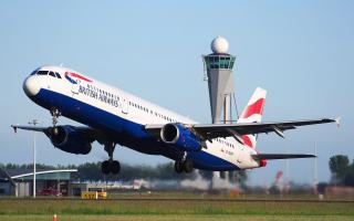 A woman racially abused a man on a British Airways flight