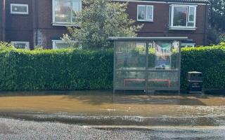 Sewage flooded a bus stop outside Jasmine Court in Patcham