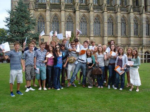 Lancing college A-level students show off their grades.