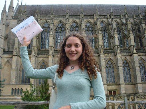 Bethany Jones from Lancing College shows off her grades.