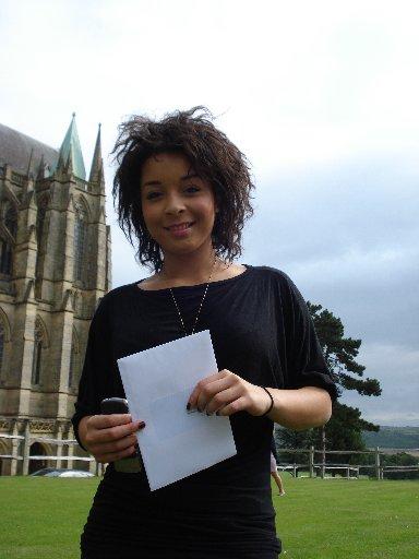 Louise Vill from Lancing College shows off her grades.