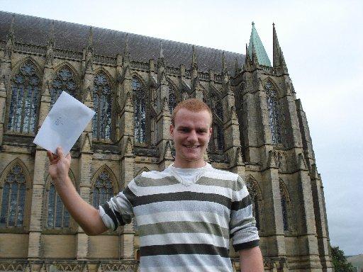Ryan Wood from Lancing College shows off his grades.