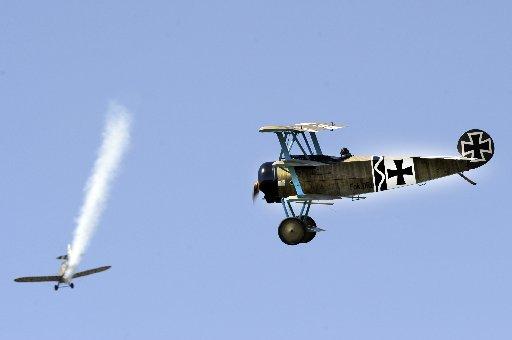 A re-enactment of a WWI dog fight including a Fokker DR1 triplane, as flown by the Red Baron.