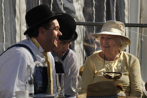 Dame Vera Lynn has a laugh with Stan and Oli.