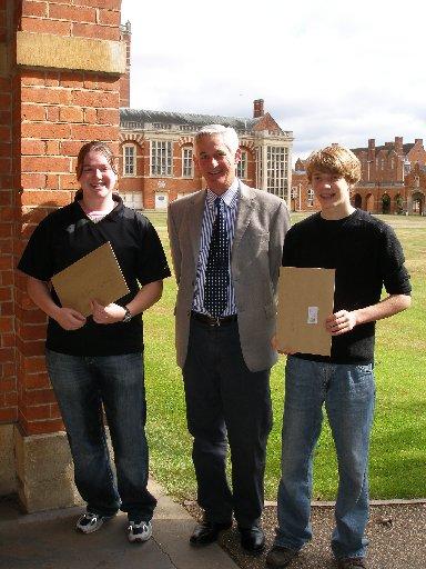 Two GCSE pupils from Christ's Hospital and Head Master, John Franklin.