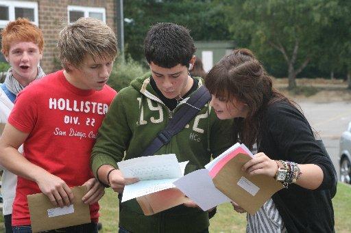 Pupils from Uckfield Community Technology College open their results.