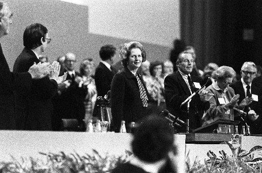 Prime Minister Margaret Thatcher recieves applause as she addresses the Conservative Party Conference the morning after the Grand Hotel where she was staying was bombed by the IRA.