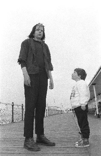 Matthew Hampton, 5, looks up in awe at the new monster attraction on Brighton's Palace Pier. Frankenstein's creation will greet passengers on the pier's ghost train. June 1989.