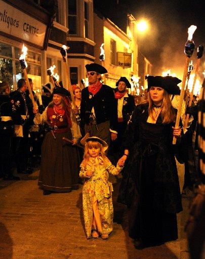 Fat cat bankers and greedy MPs went up in flames last night at the Lewes Bonfire celebrations.

Thousands of people flocked to the town to watch the effigies as they were paraded through the streets.


One effigy featured the former Home Secretary Ja