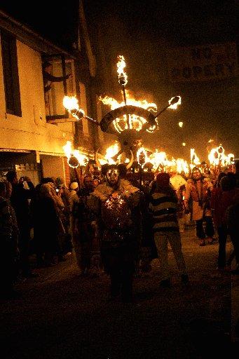 Fat cat bankers and greedy MPs went up in flames last night at the Lewes Bonfire celebrations. Thousands of people flocked to the town to watch the effigies as they were paraded through the streets. One effigy featured the former Home Secretary Jacqui Smi