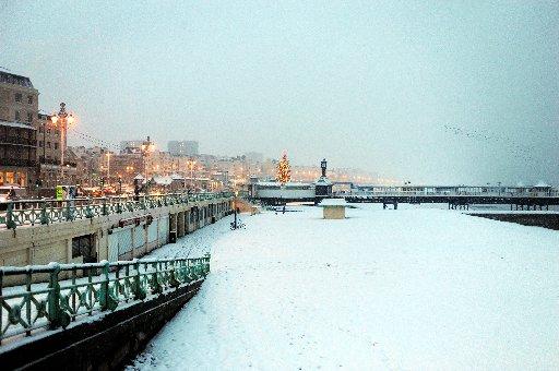 Brighton beach covered in snow this morning