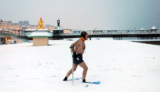 Dave Sawyers fronm Brighton Swimming Club didn't let the weather beat him this morning