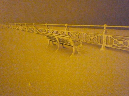 Virgin snow on Brighton seafront, midnight by Klara Cservenka