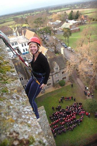 Teacher Sarah Deelman abseils down the 150-year-old chapel tower at Hurstpierpoint College. She's raised more than £1,000 and counting.