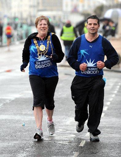 Brighton's mayor Cllr Ann Norman with Robbie Robertson take part in the Sussex Beacon Half Marathon