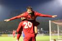 Ollie Pearce gets a lift as he scores a Worthing hat-trick