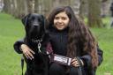 Elyana Kuhlemeier with her hearing dog Gordon