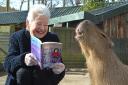 Jacqueline Wilson reading to a capybara
