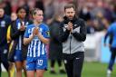 Julia Zigiotti and Mikey Harris applaud fans after Albion's defeat
