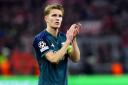 Arsenal’s Martin Odegaard applauds the fans at the end of the Champions League quarter-final defeat to Bayern Munich. (Nick Potts/PA)