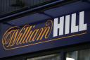William Hill owner 888 reported higher than expected revenues in the last quarter (Aaron Chown/PA)