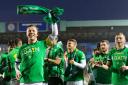 Celtic captain Callum McGregor celebrates with his team mates at Rugby Park last night after the Parkhead club had clinched the Scottish title
