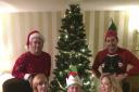 Mark Brailsford (centre) and The Treason Show team in Christmassy mood