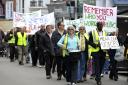 Campaigners march through Lewes against plans to build home on the 49 sites.  Picture: Terry Applin
