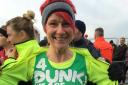 Tracey Prescott smiling after completing one of her runs