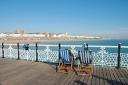 People relaxing on Brighton Palace Pier