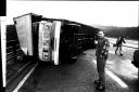Storm 1990 - Driver Chris Jenkins from Gwent with his overturned lorry on the A27 Shoreham flyover