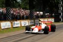 Lewis Hamilton drives an historic McLaren F1 car during the Goodwood Festival of Speed