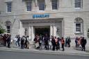 SmashEDO protesters gather outside Barclays Bank in Brighton