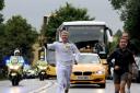 IT'S HERE! The torch arrives in Rogate, Sussex this morning