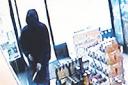 The masked robber on CCTV footage