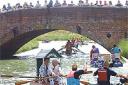Crowds gather to watch the competitors in the 2006 Adur Bath Tub Race