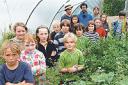 Food project volunteers with children from the nearby Steiner School who help out at the allotments