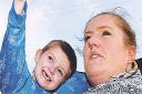 Michelle Huggett and son Jacob, five, spotted what she believes was a UFO