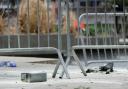A metal can sits on the ground at the scene (AP Photo/Mary Altaffer)
