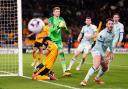 Bournemouth goalkeeper Mark Travers helps his side win at Wolves