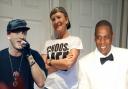 Jill Clark says rappers such as Eminem, left, and Jay-Z, right, have inspired her to rap for a good cause