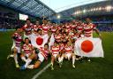 Japan celebrate their famous win over South Africa in the 2015 men's Rugby World Cup