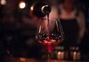 Removing the largest serving of wine at pubs and bars reduced the amount of wine sold, a study found (Alamy/PA)