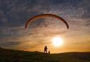 A paraglider preparing to take off from Devil's Dyke