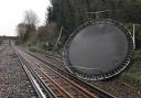 A trampoline on train tracks. Residents who live near the railways are told to secure any loose items in their gardens