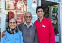 Narotam, Rama and Amit Patel outside their Post Office