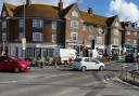 A councillor said she directed traffic in Rottingdean this morning after temporary traffic lights stopped working