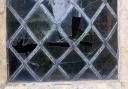 The smashed Victorian leaded glass window